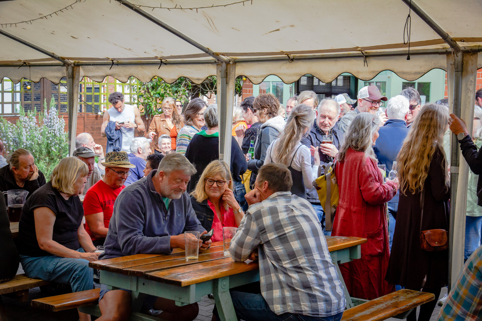 Green Dragon, Bungay, Suffolk - a busy beer garden listening to the Likes of Us play music