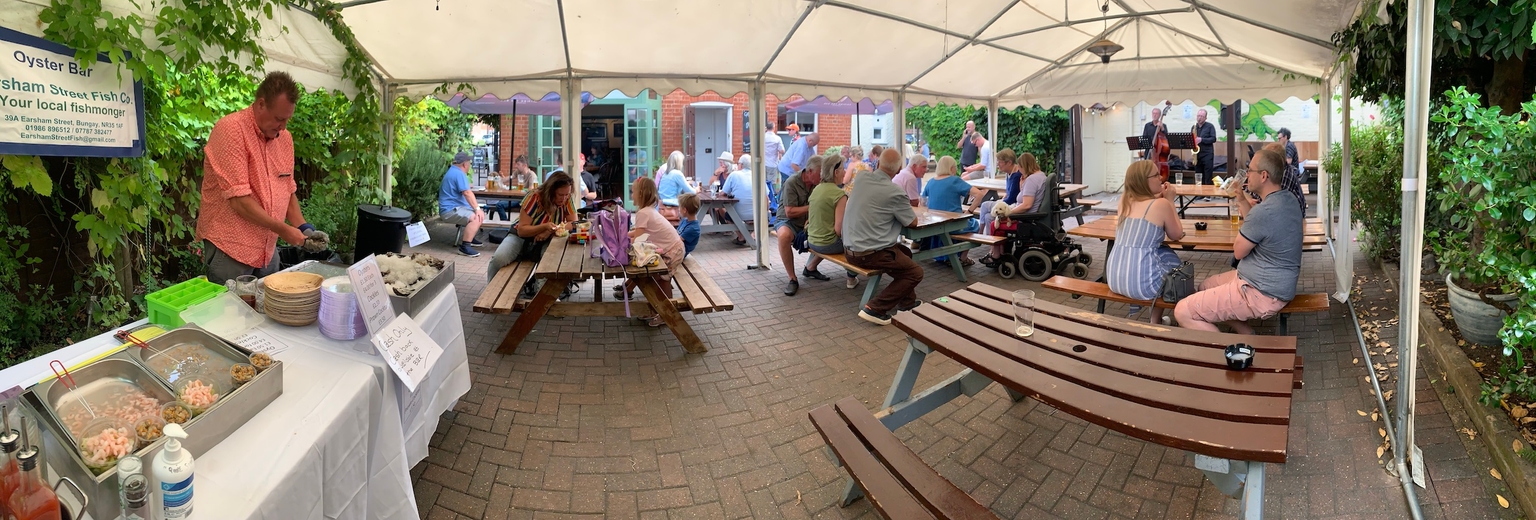 A panorama of the Green Dragon beer garden during their annual oyster bar.